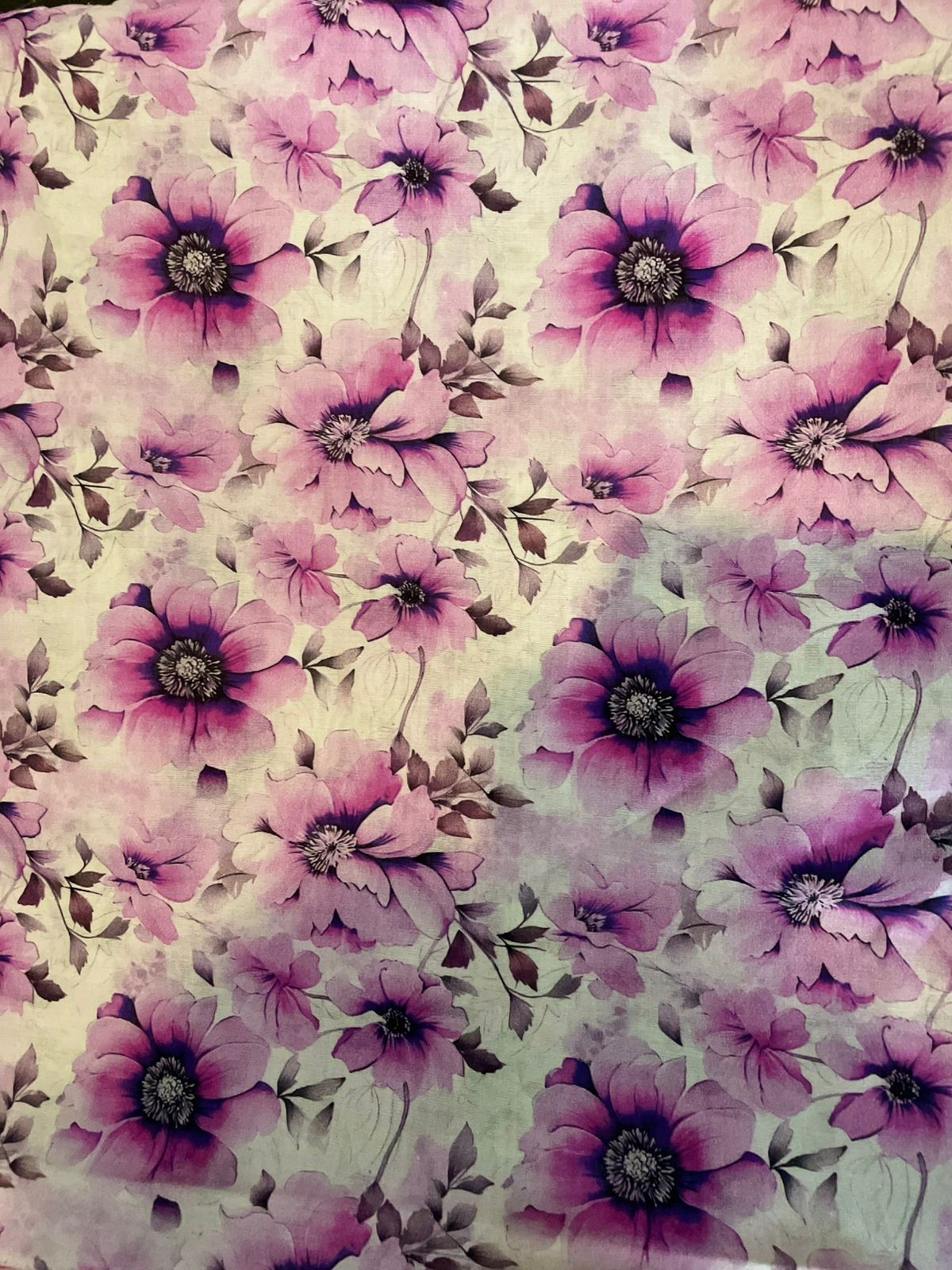 Pattern of pink flowers with green leaves on a light background