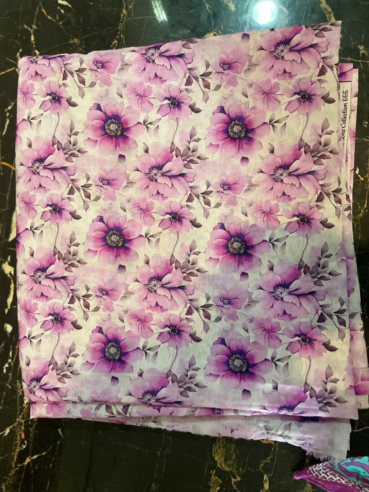 Floral fabric with purple flowers on a white background