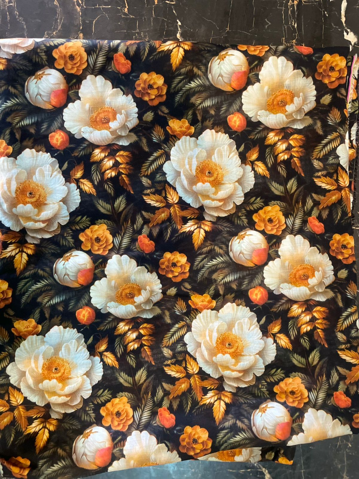 Floral pattern with white and orange flowers