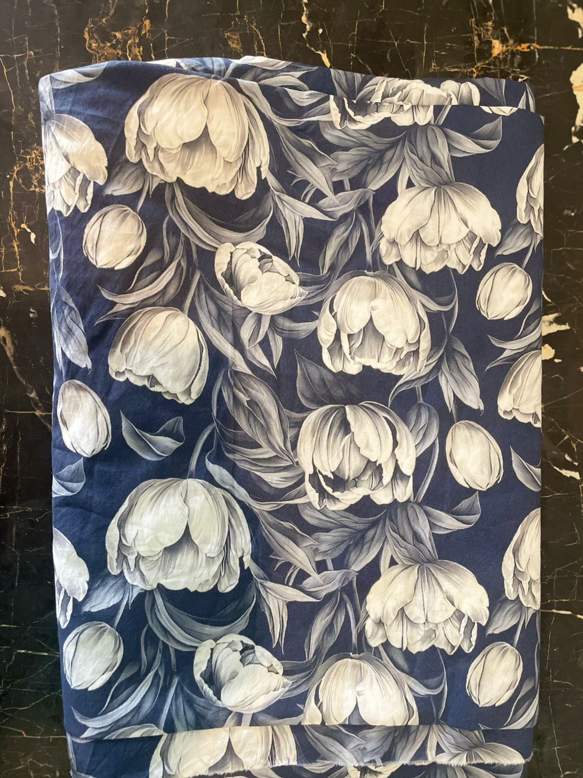 Floral patterned fabric with white flowers