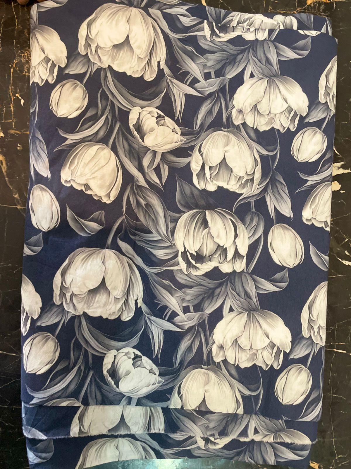 Floral patterned fabric with white flowers